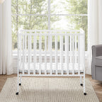 Delta Children Lee Portable Folding Mini Crib with 1.5-Inch Mattress - Greenguard Gold Certified, Bianca White
