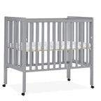 Delta Children Lee Portable Folding Mini Crib with 1.5-Inch Mattress - Greenguard Gold Certified, Bianca White