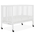Dream On Me Quinn Full-Size Folding Crib. Removable Wheels. Modern Nursey. Adjustable Mattress Support. Patent Folding System in White