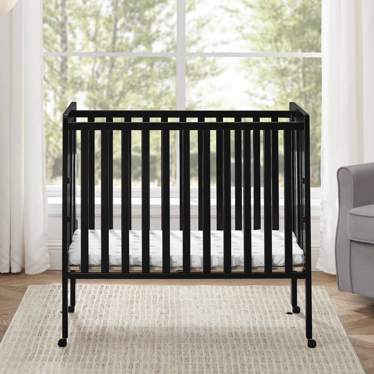 Delta Children Lee Portable Folding Mini Crib with 1.5-Inch Mattress - Greenguard Gold Certified, Bianca White