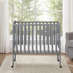 Delta Children Lee Portable Folding Mini Crib with 1.5-Inch Mattress - Greenguard Gold Certified, Bianca White
