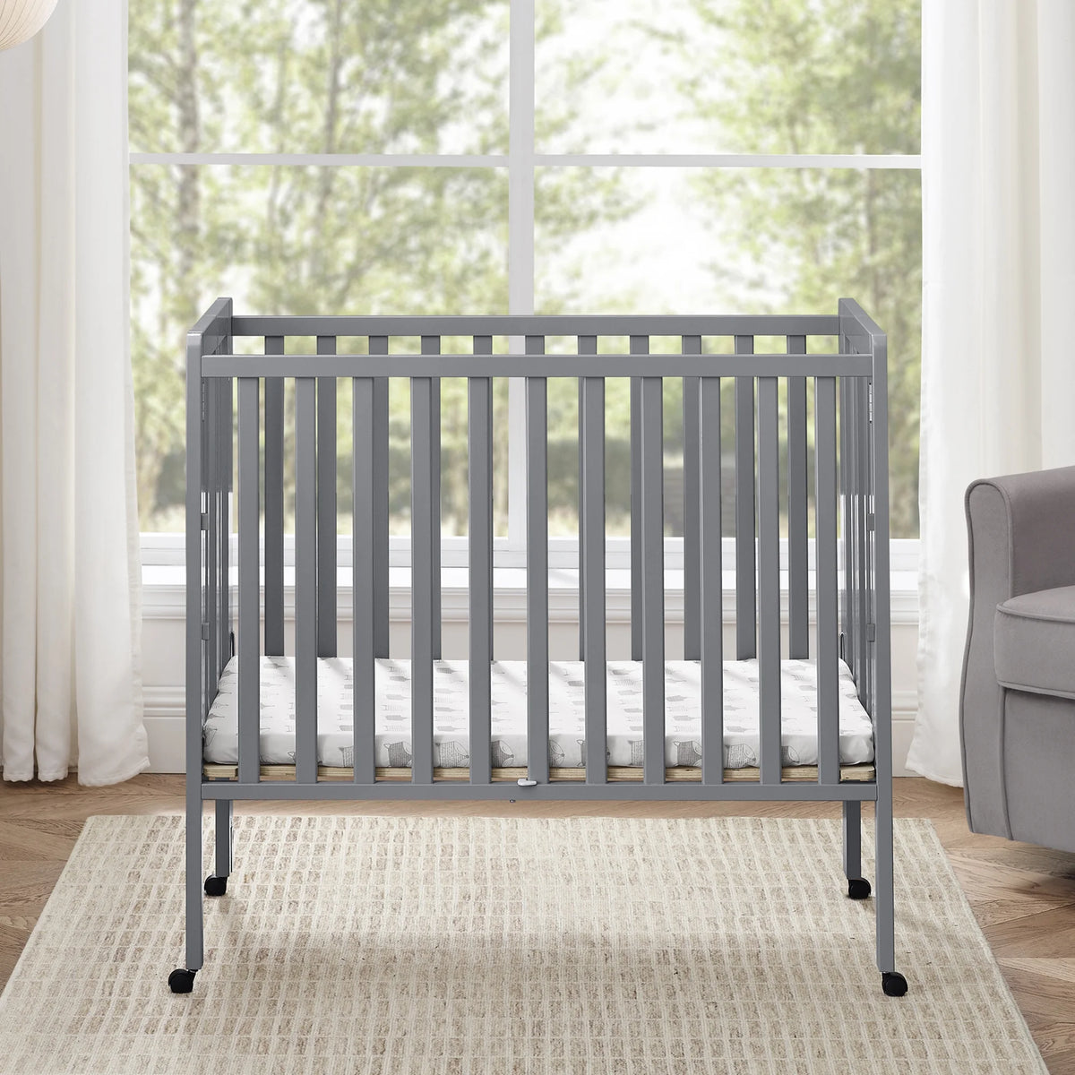 Delta Children Lee Portable Folding Mini Crib with 1.5-Inch Mattress - Greenguard Gold Certified, Bianca White
