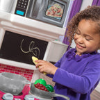 Step2 Great Gourmet Soft Pink Plastic Toddler Kitchen with 35 Piece Kitchen Playset