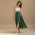 Green floral high waist skirt photographed from the front against white